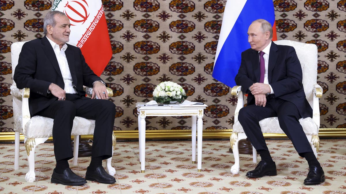 Russian President Vladimir Putin, right, met with Iranian President Masoud Pezeshkian, left, on Friday, hailing the "very close" relationship between Russia and Iran.