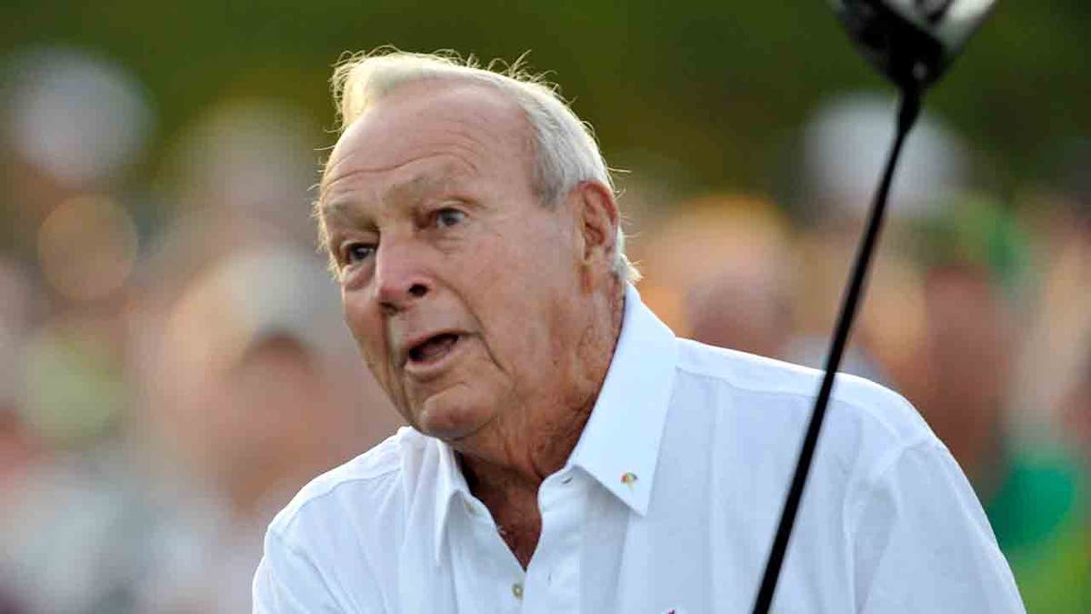 Arnold Palmer swings