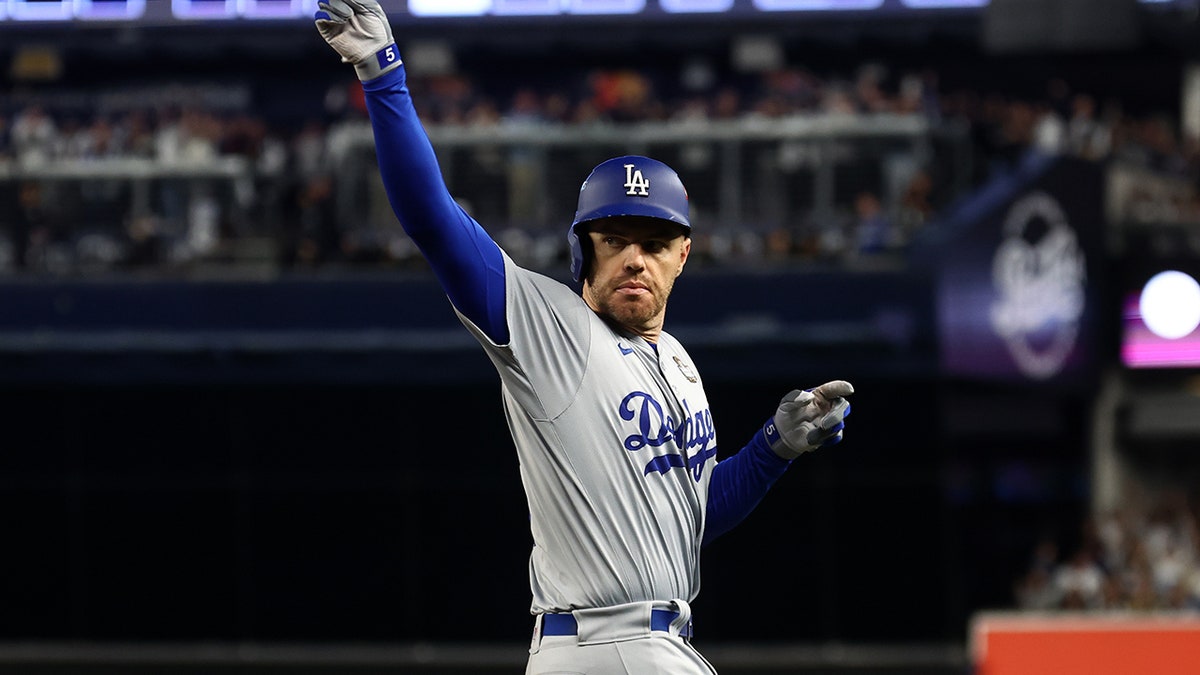 Freddie Freeman celebrates the home run