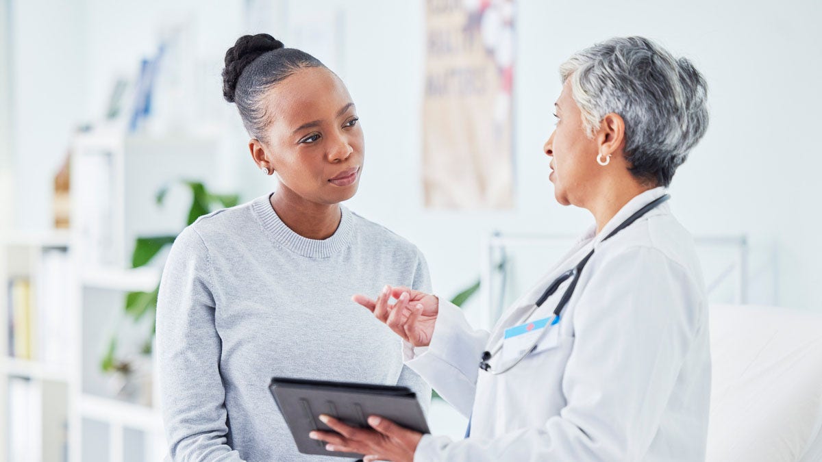 Femme chez le médecin