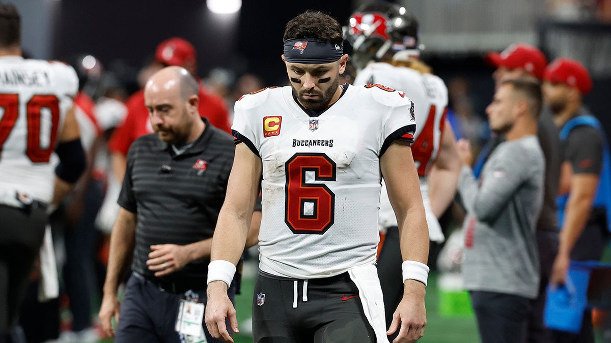 Baker Mayfield walks off the field