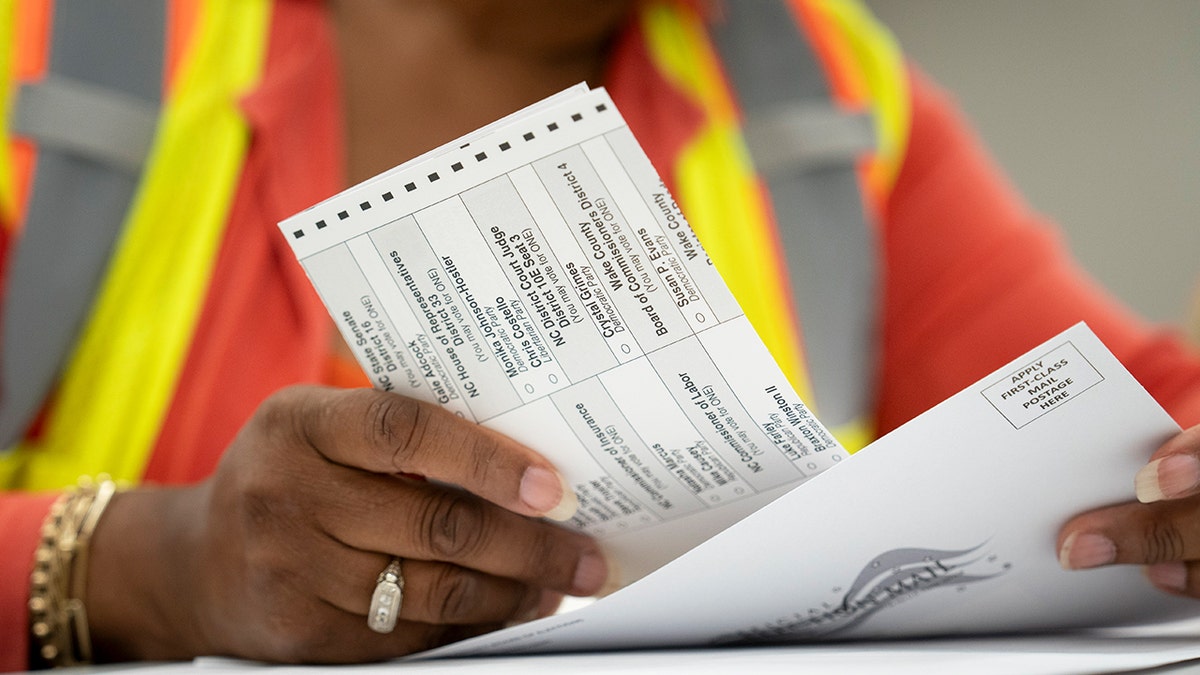 Absentee ballots are prepared to beryllium  mailed astatine  the Wake County Board of Elections connected  Sept. 17, 2024 successful  Raleigh, North Carolina.