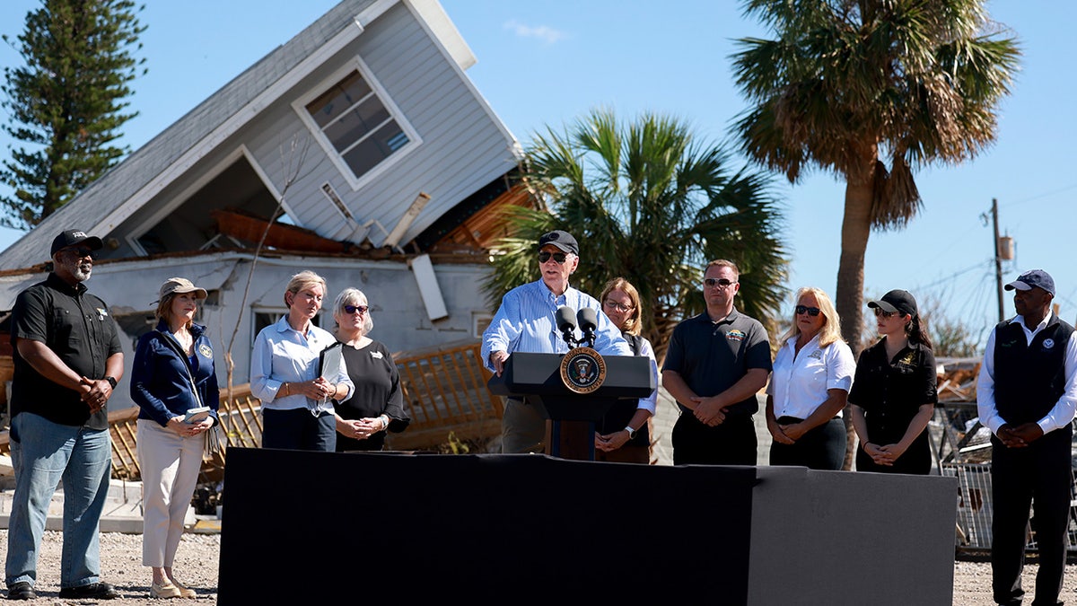 Biden press conference in front of hurricane damage