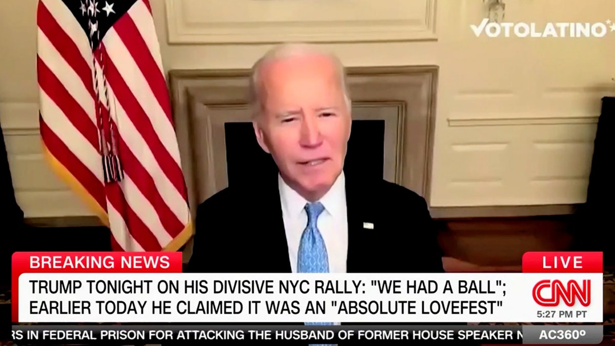 Biden pinch US emblem down him successful CNN still grab