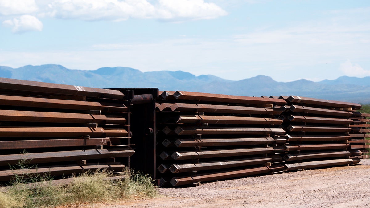 Border fence construction materials sit unused on the U.S.-Mexico border on Aug. 22, 2024, south of Sierra Vista, Ariz. 