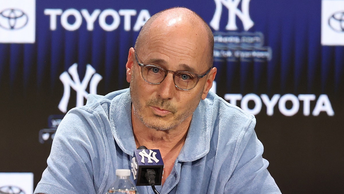 Brian Cashman talks to the press