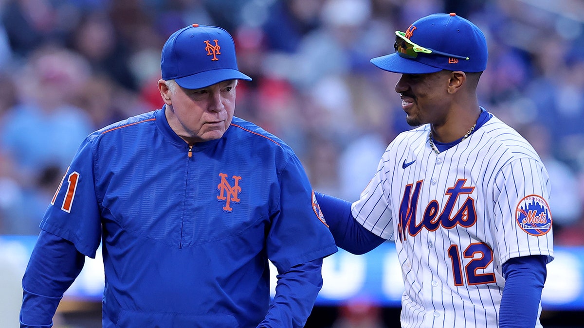 Francisco Lindor y Buck Showalter