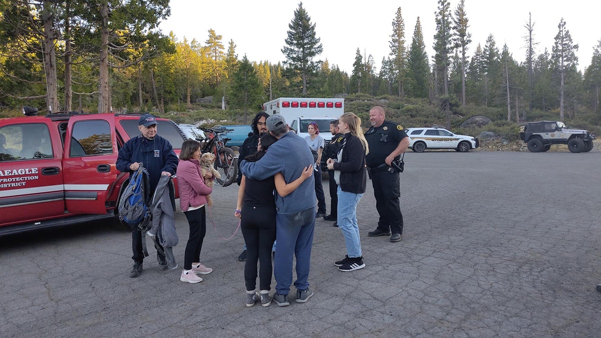 Teen hiker reunited with family