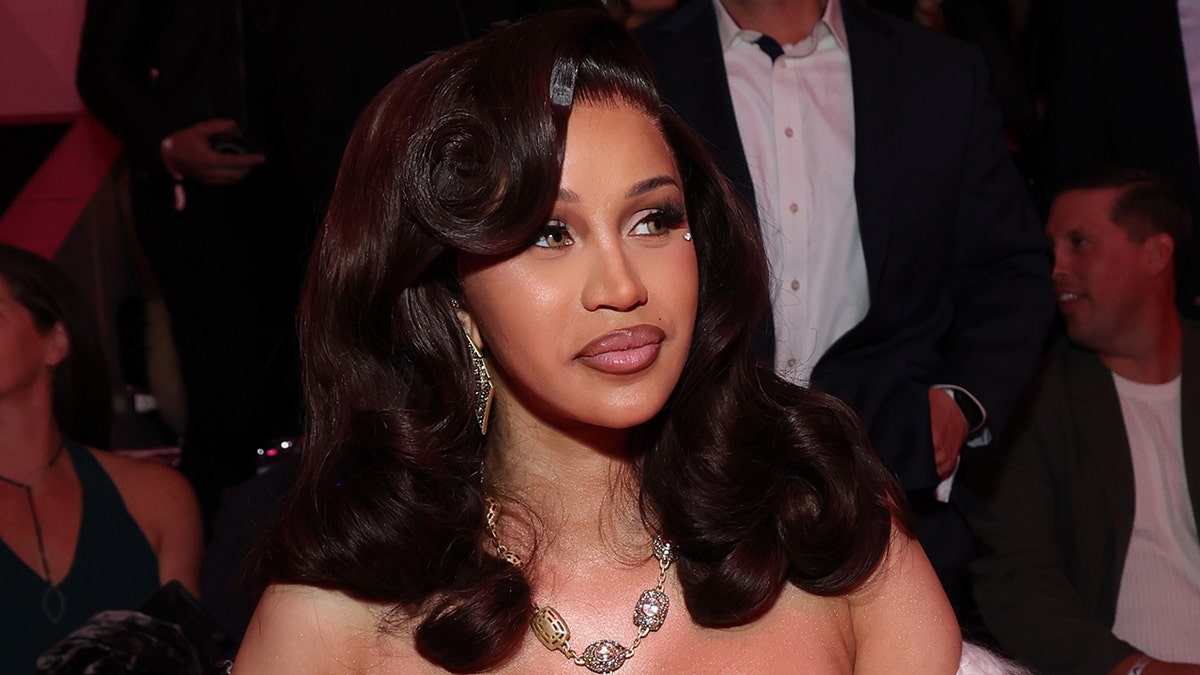 Cardi B successful a pinkish dress