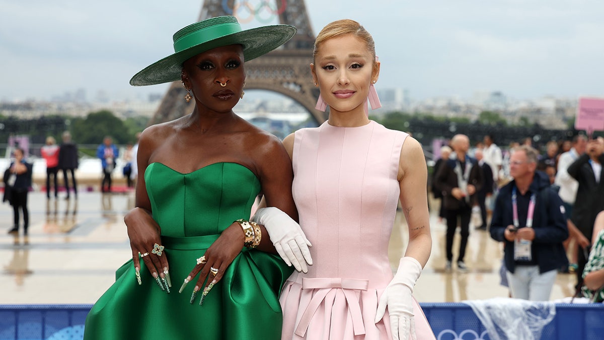 Cynthia Erivo and Ariana Grande posing successful  beforehand   of Eiffel Tower