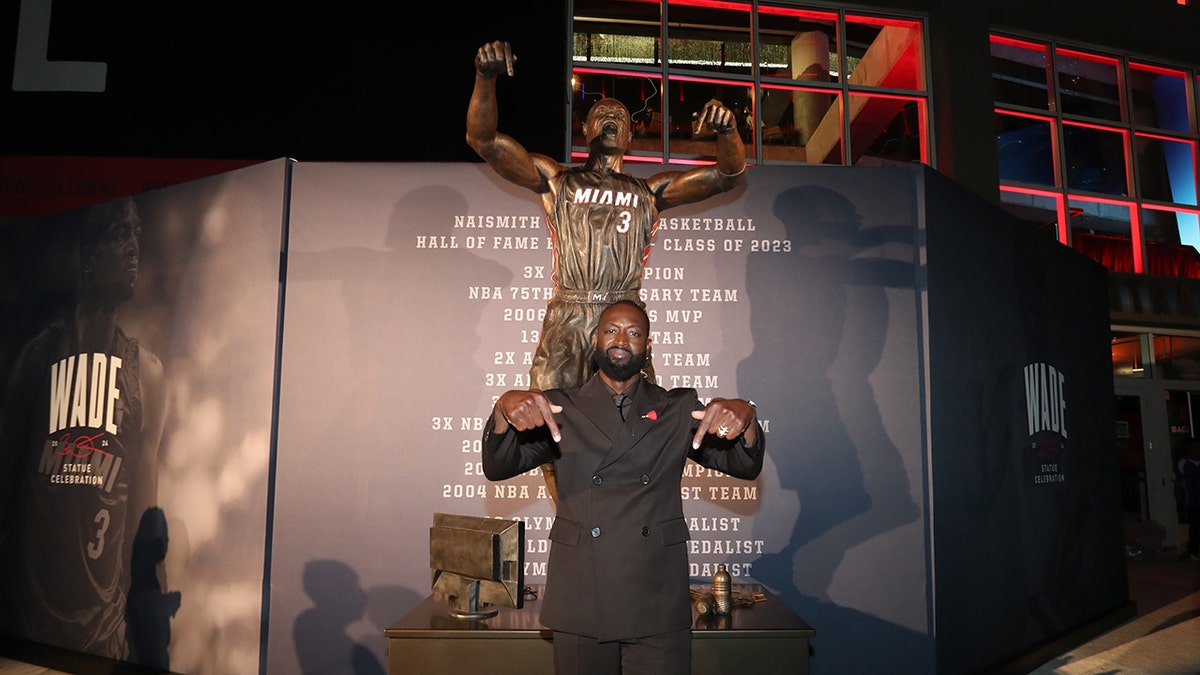 D Wade with statue