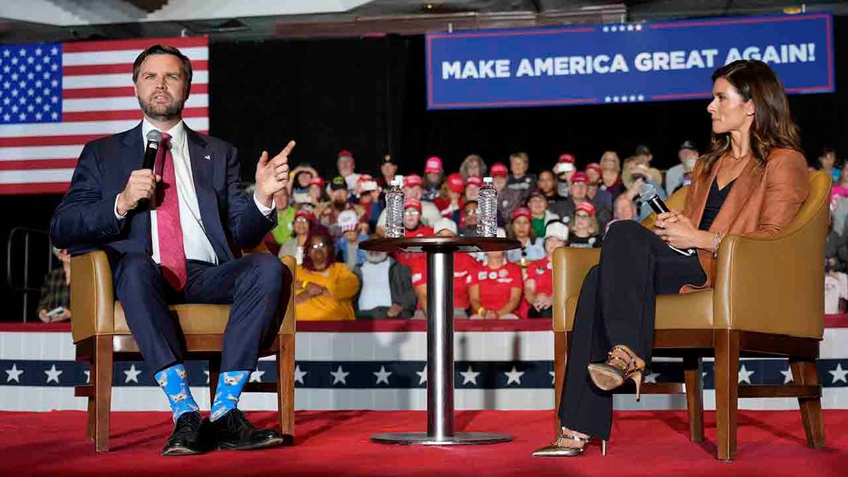 JD Vance and Danica Patrick astatine  rally