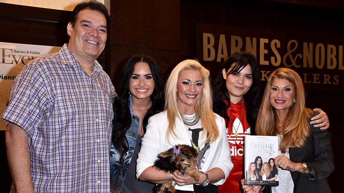 Lovato with her family