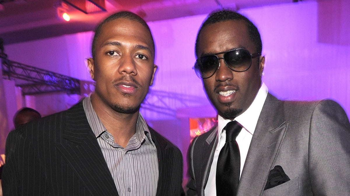 Diddy and Nick Cannon smile in photo