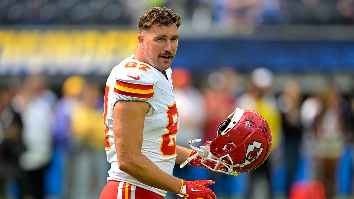 Travis Kelce aquece