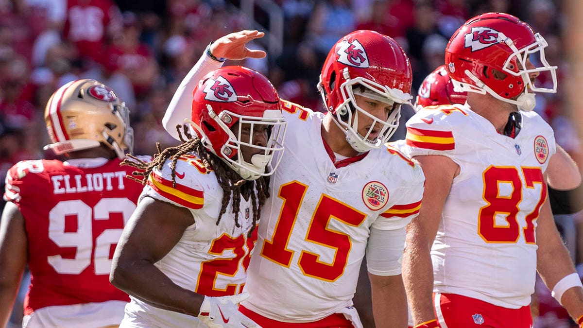 Patrick Mahomes celebrates the touchdown with Kareem Hunt