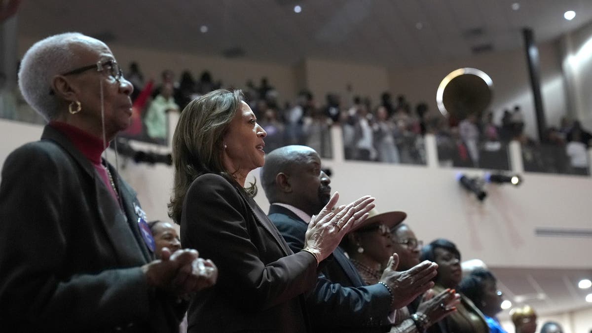 Church elder Joy Hollingshed, left, and Democratic statesmanlike nominee Vice President Kamala Harris be a work astatine nan Church of Christian Compassion connected Sunday, Oct. 27, 2024 successful Philadelphia.