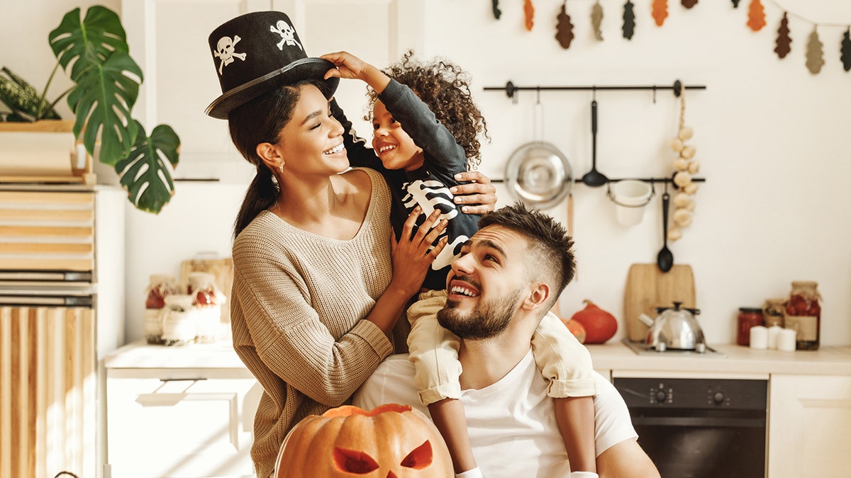 Family celebrating Halloween