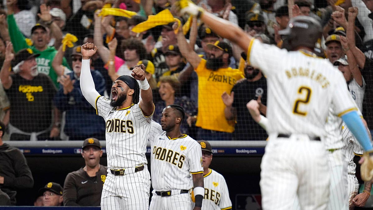 Fernando Tatis Jr. waves the towel