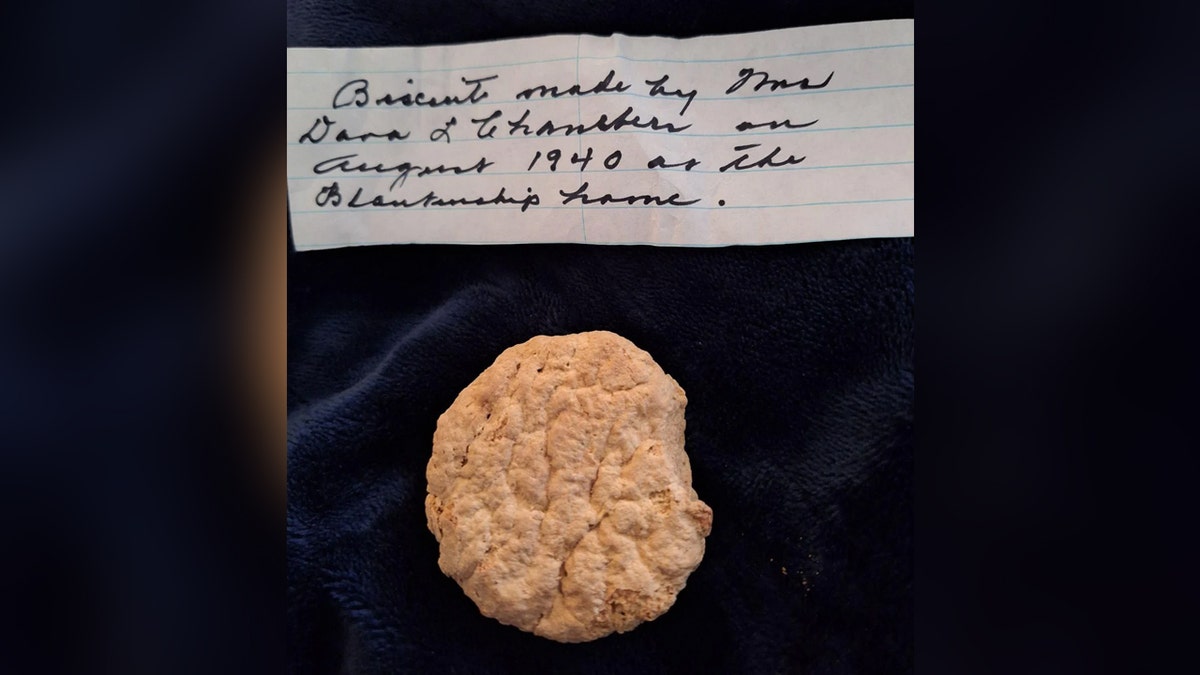 A representation   of a frozen biscuit and the enactment      that came with it. The enactment      states the biscuit was made successful  1940.