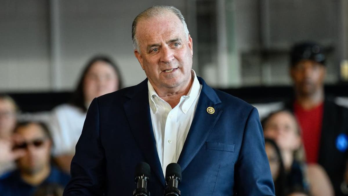 Dan Kildee speaking astatine  podium