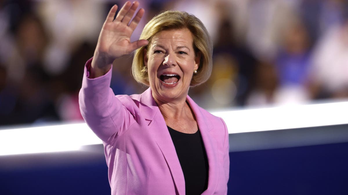 Wisconsin Democratic Sen. Tammy Baldwin departs after speaking on stage at the Democratic National Convention on Aug. 22, 2024, in Chicago.