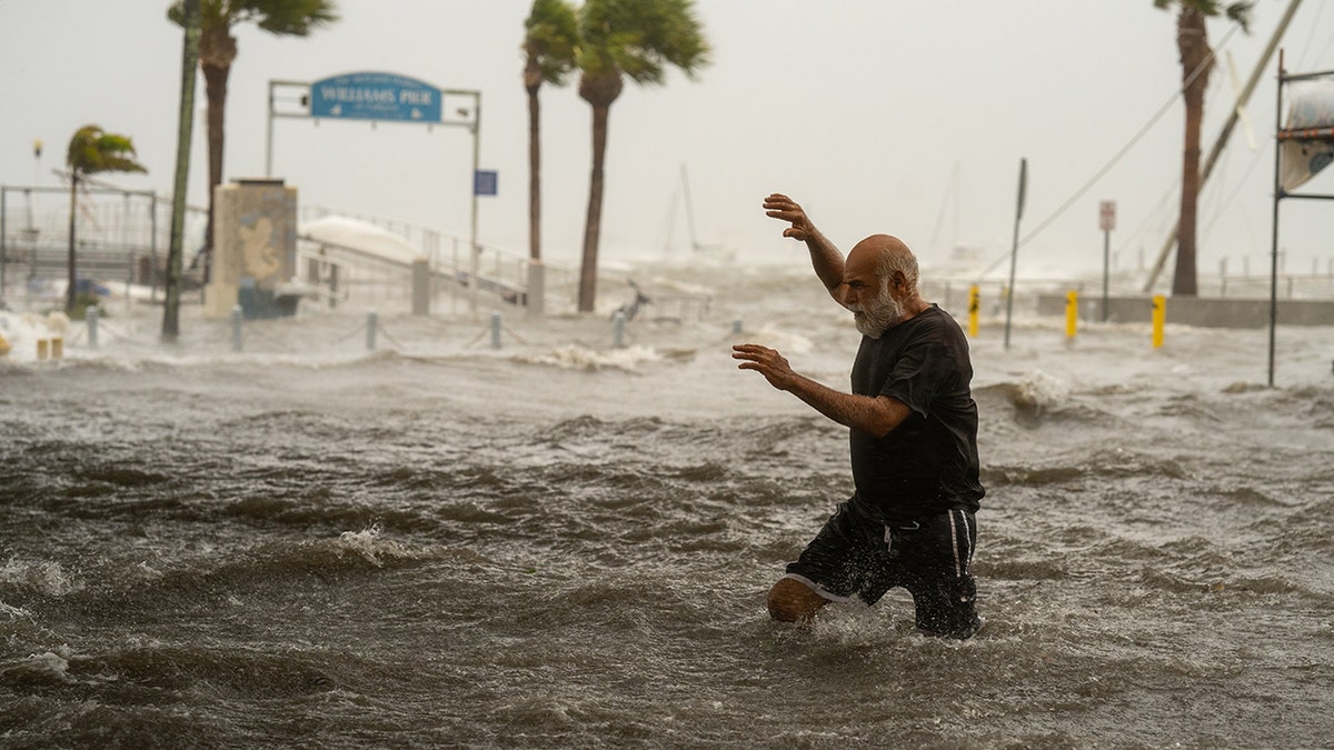 man crosses waters successful  hurricane helene