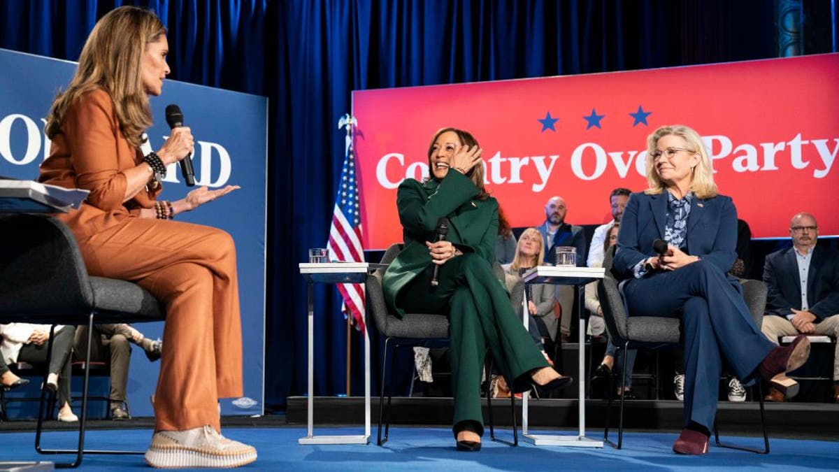 Vice President Kamala Harris sits pinch erstwhile U.S. Rep. Liz Cheney (R-WY) for a municipality hallway pinch Maria Shriver astatine nan Royal Oak Music Theatre connected October 21, 2024 successful Royal Oak, Michigan, United States. (Photo by Sarah Rice/Getty Images)