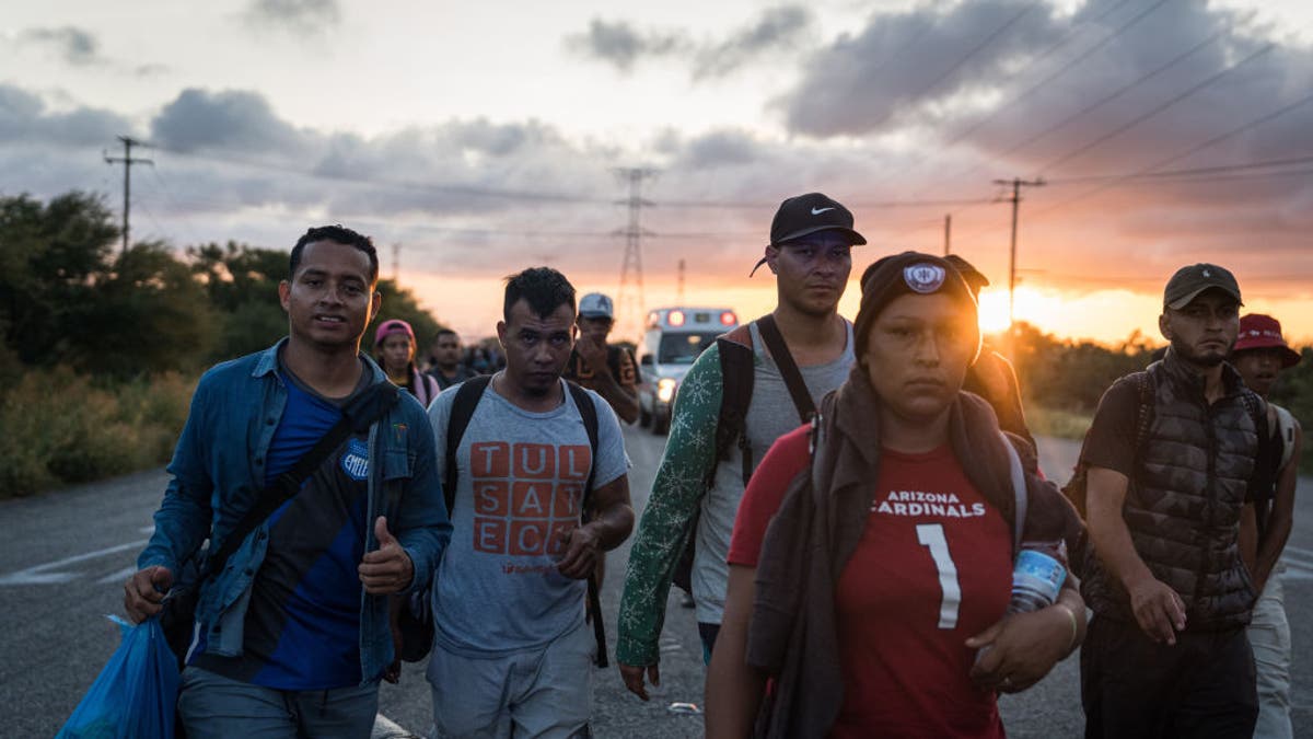 migrants on road, closeup shot