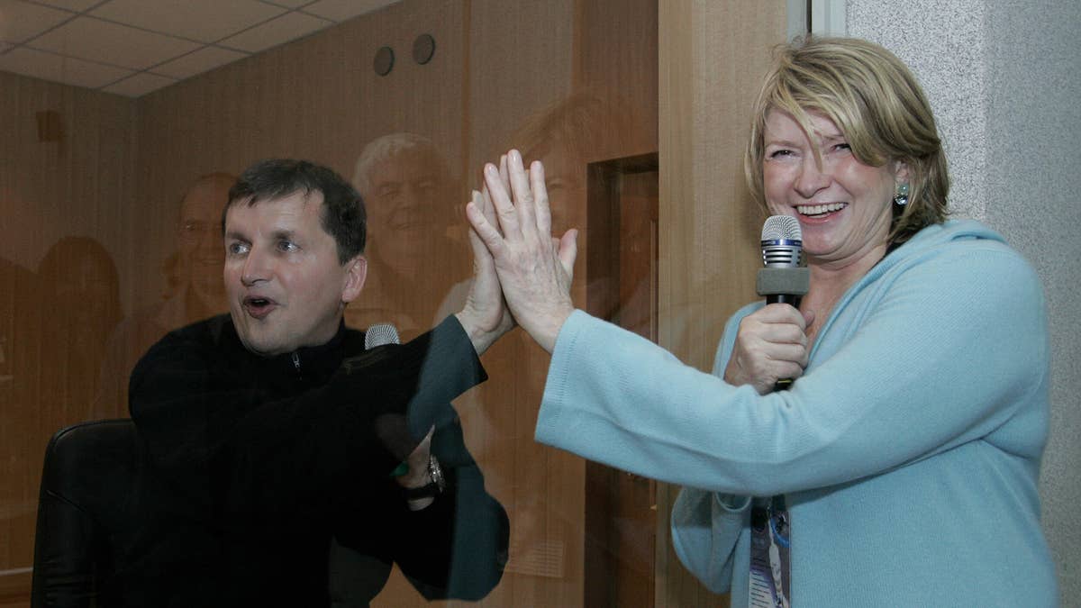 charles simonyi high five with martha stewart 