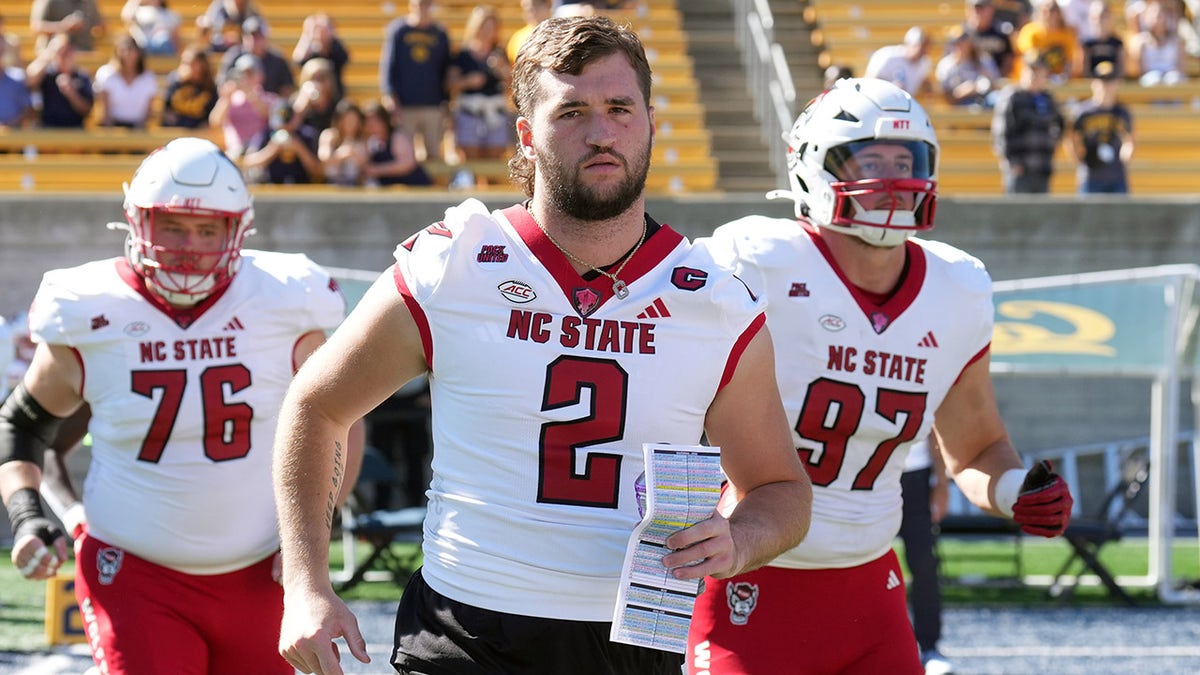 Grayson McCall runs onto nan field