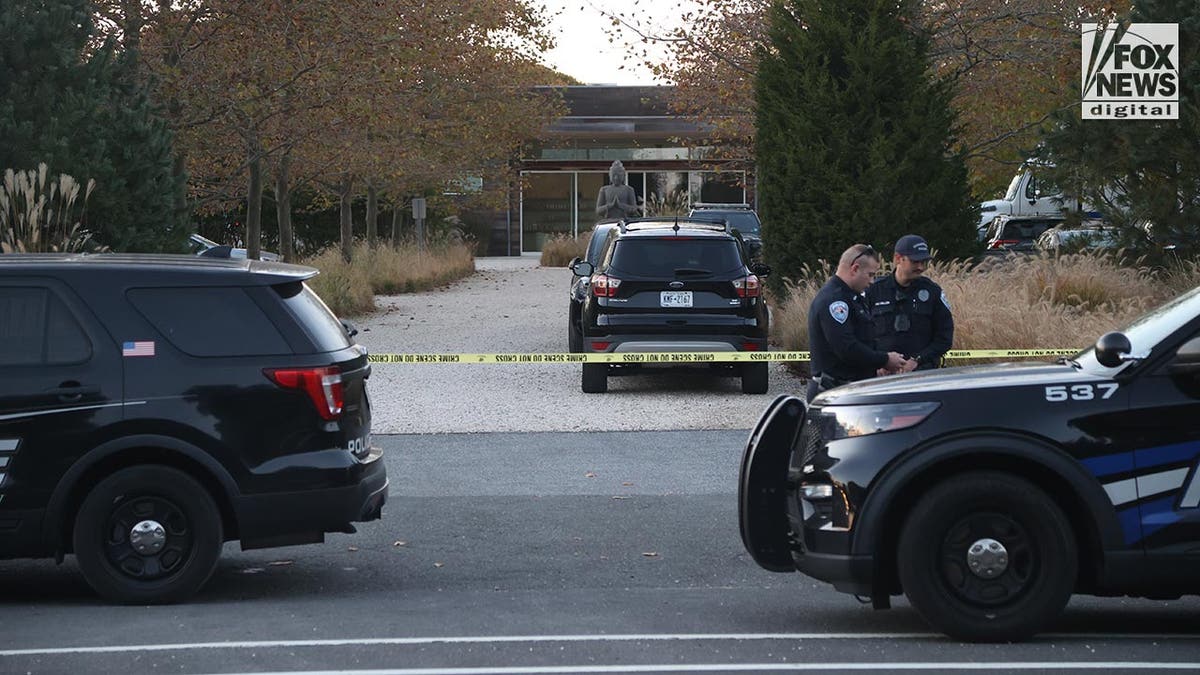 Police at the scene of a woman's murder at a swank Hamptons spa