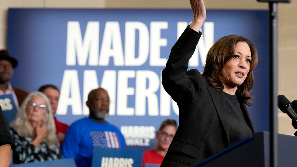 Vice President Kamala Harris speaks at UAW Local 652 during a campaign event in Lansing, Michigan, on Friday.