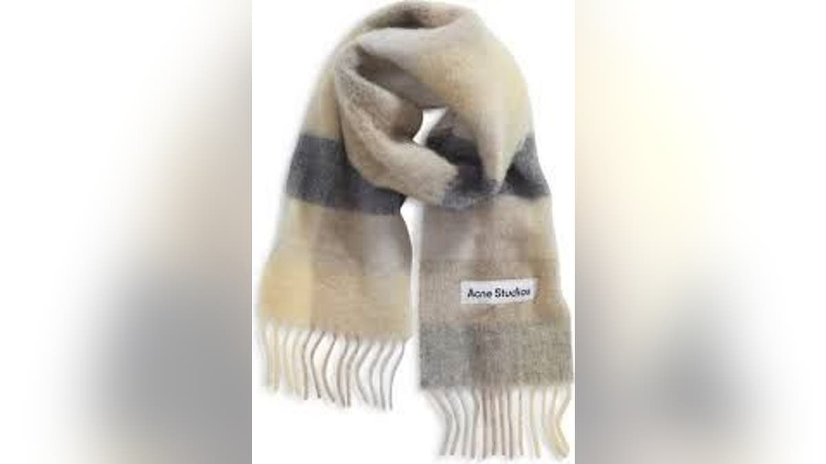 Grab this warm, oversized scarf for a trending wintertime look.