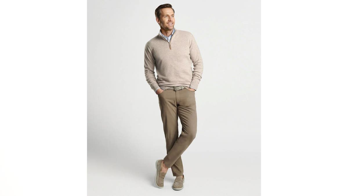 Dress up   khakis with this apical  of the enactment     Cashmere quarter-zip from Peter Millar.