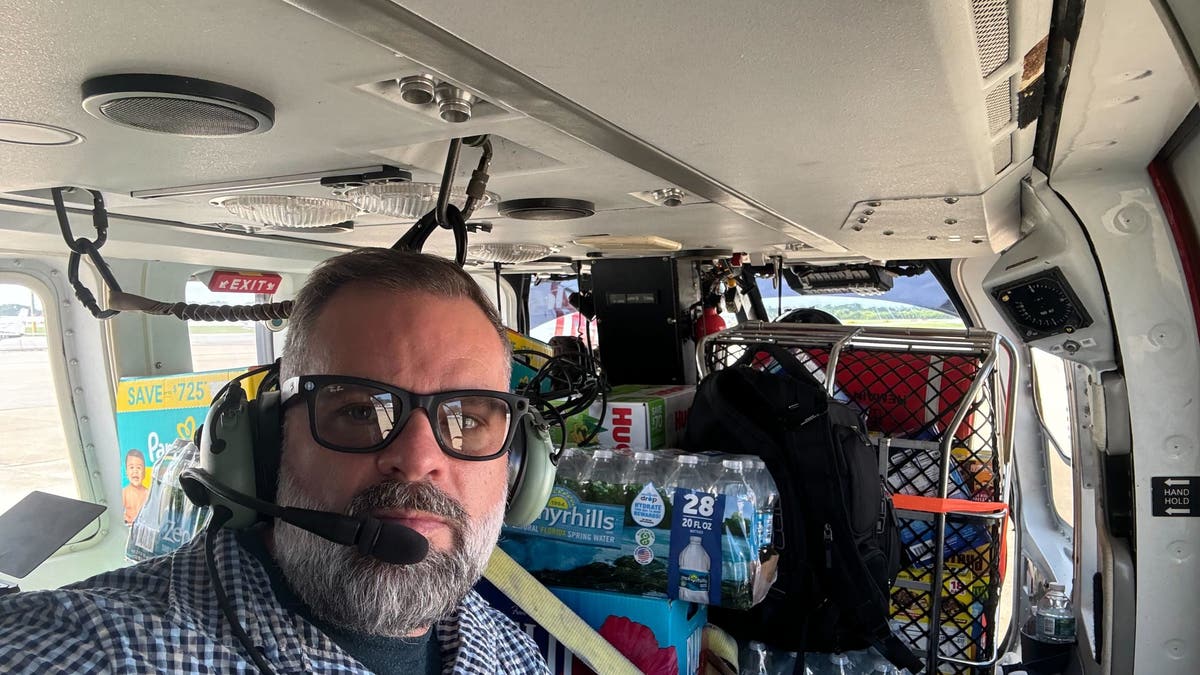 Rep. Cory Mills in helicopter on NC rescue mission