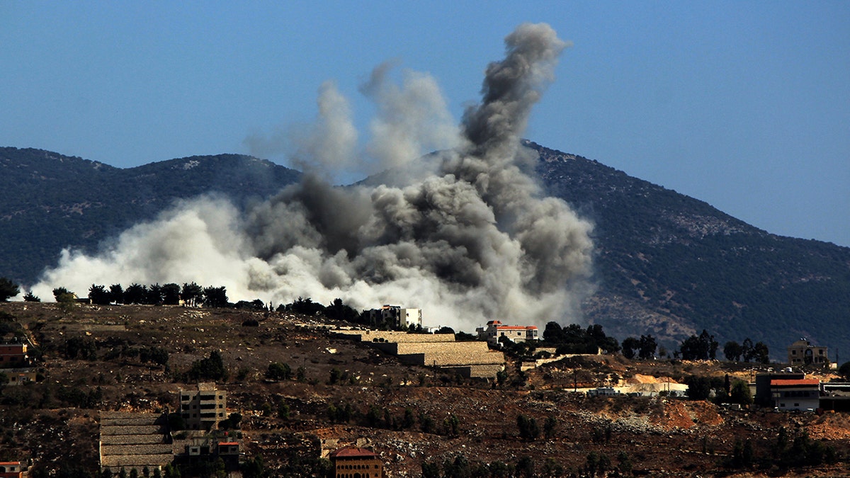 Heavy smoke billows from an Israeli airstrike on an area between the Lebanese southern border villages of Kfarkela and Aadaysit Marjaayoun on Oct. 2.