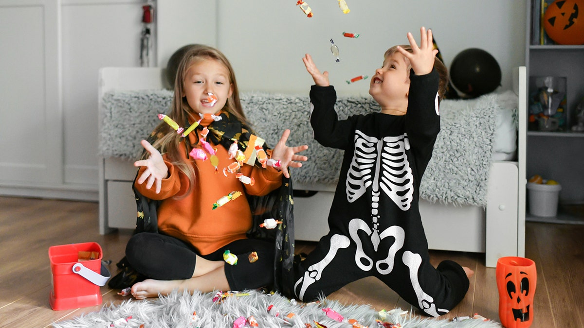 kids enjoy candy collected for Halloween