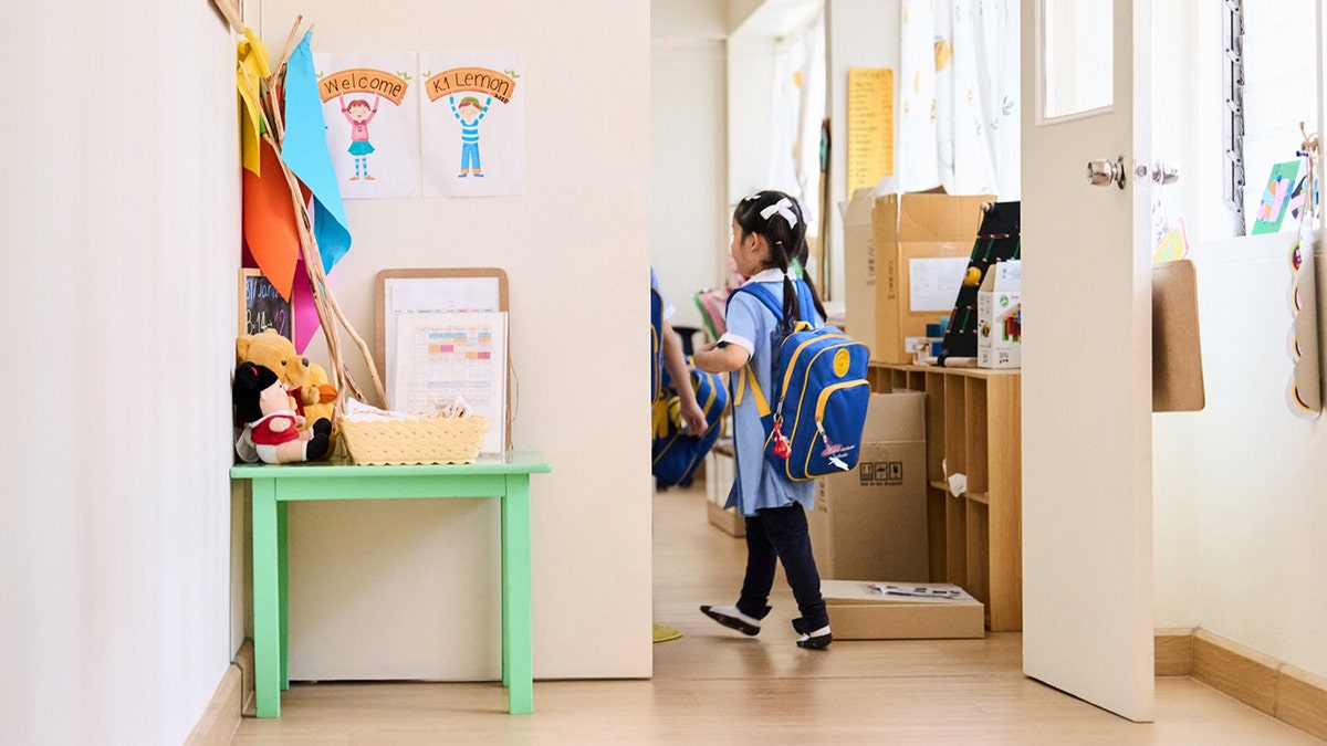 Student with schoolbag stock image