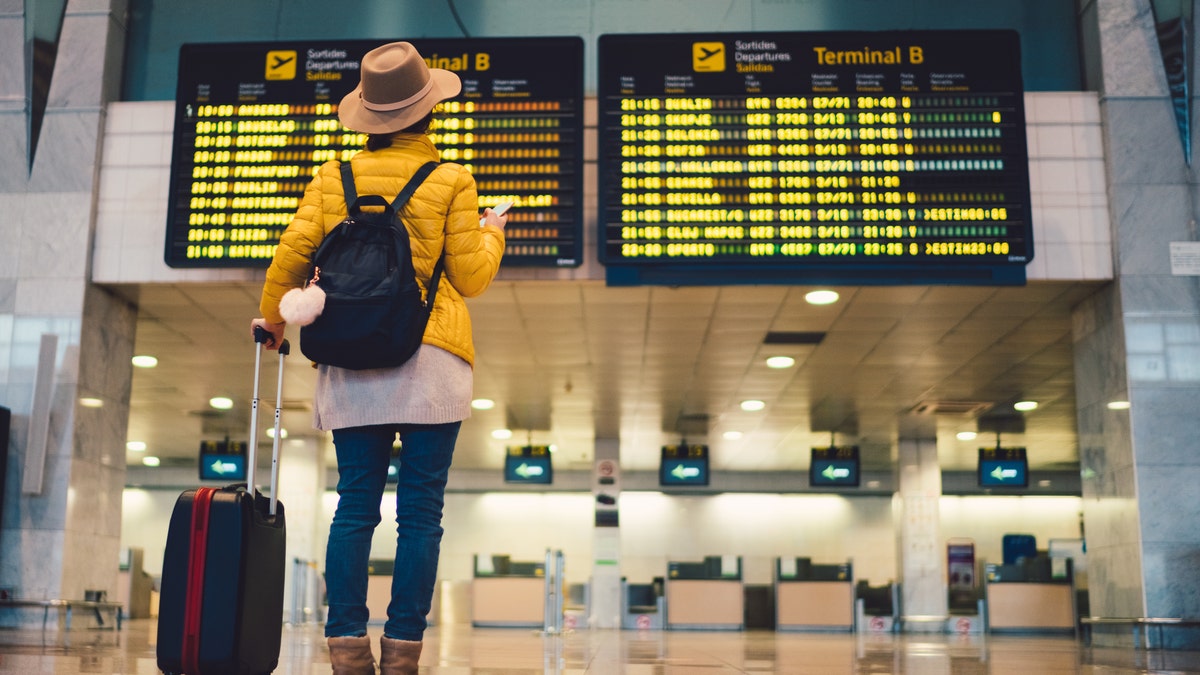 Traveler at the airport passport messages