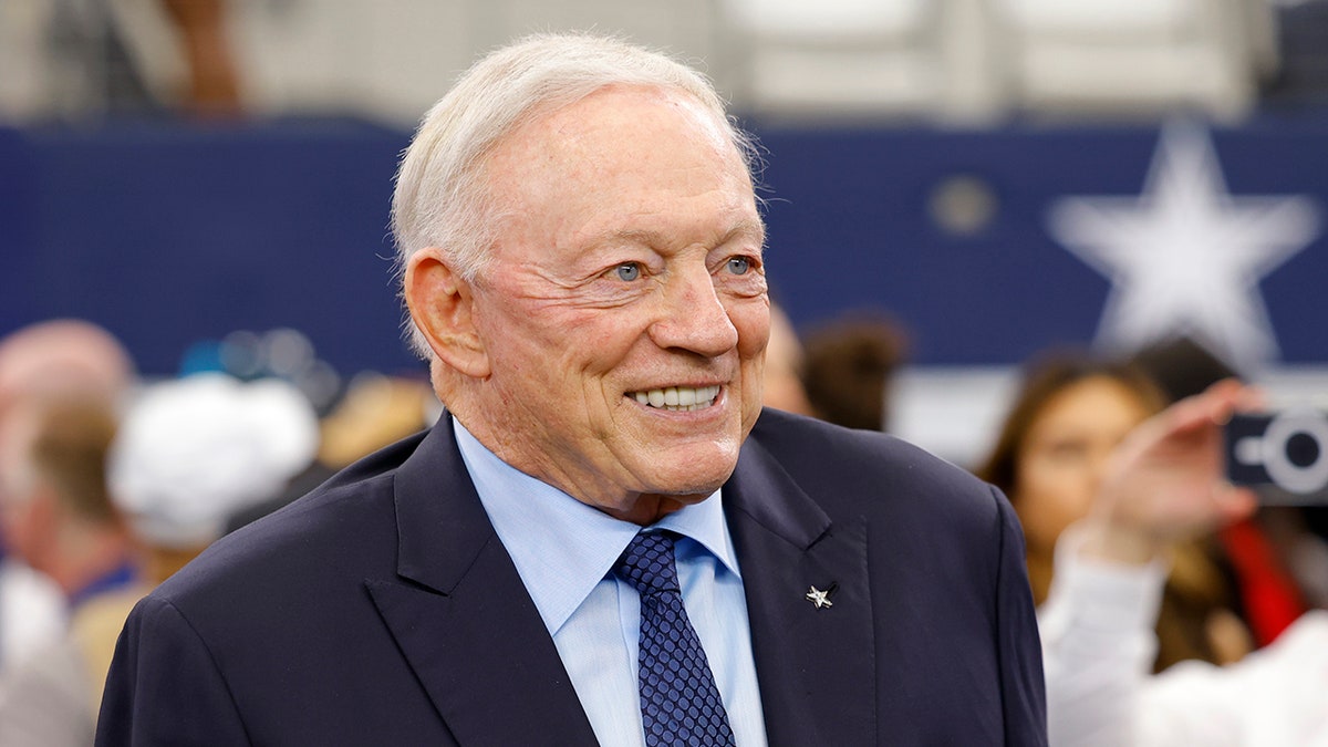 Jerry Jones on the field during warmups