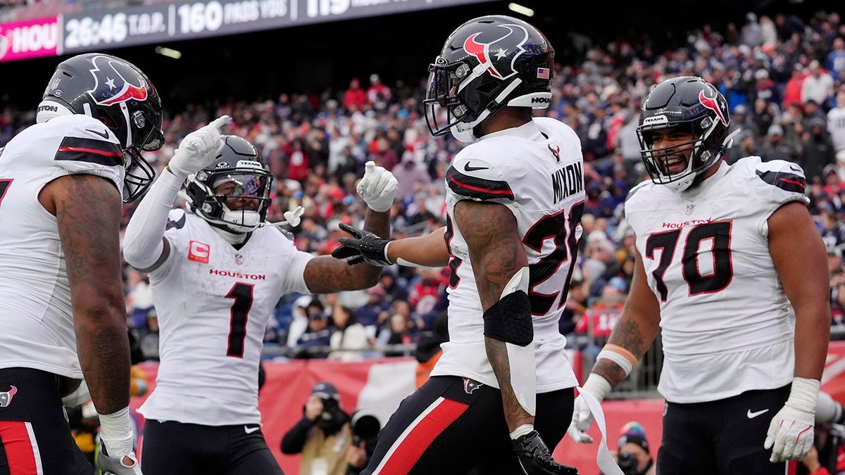 Stefon Diggs and Joe Mixon celebrate