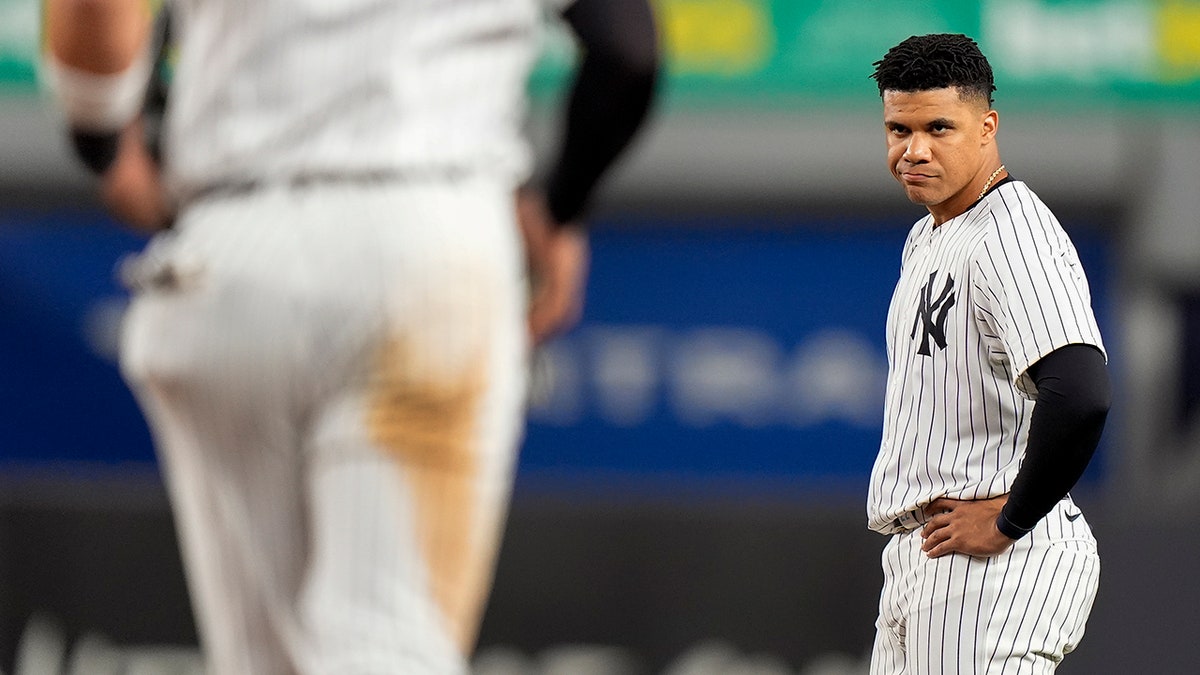 Juan Soto looks on