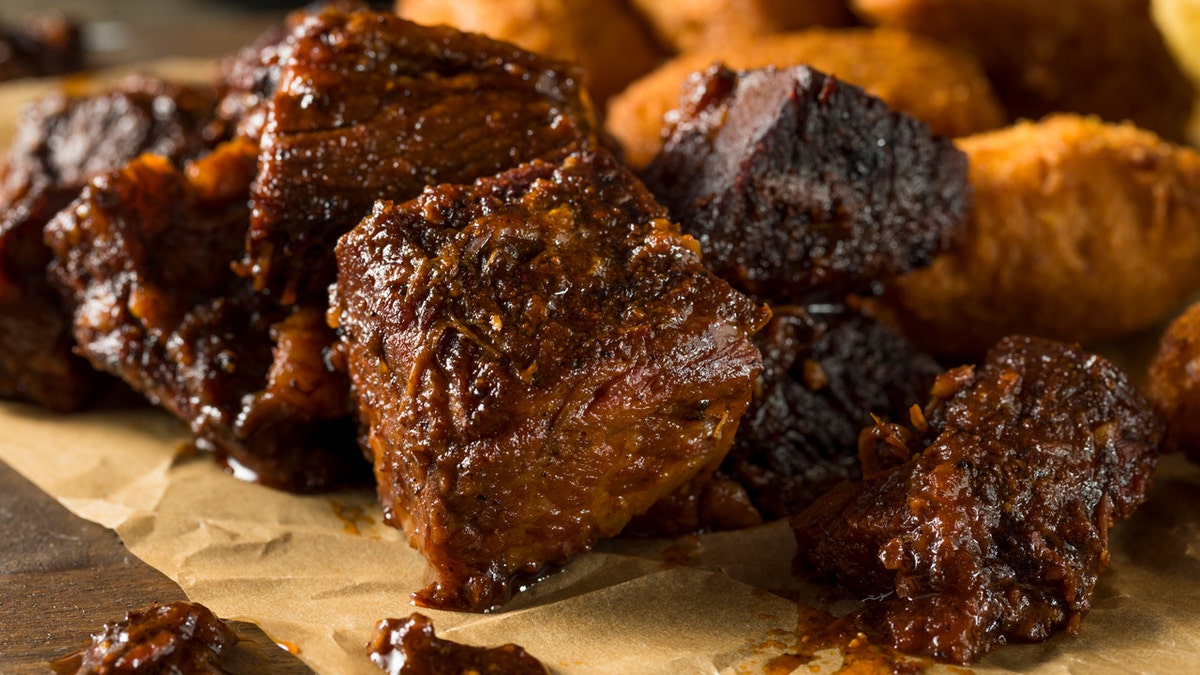 Homemade Kansas City-style burnt ends barbecue is shown.