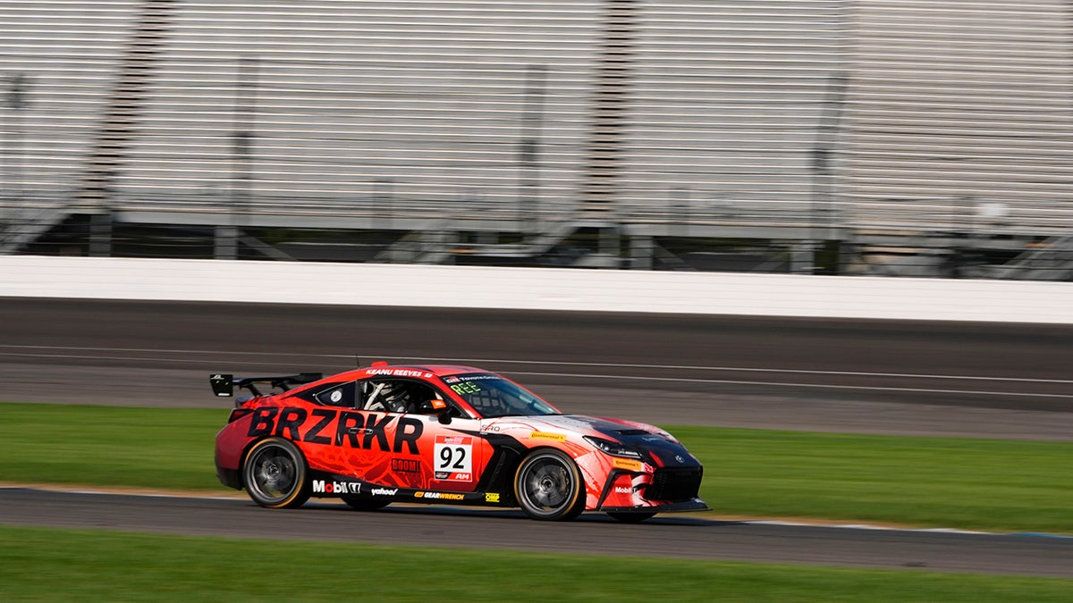 Keanu Reeves spins out during professional racing debut at Indianapolis  at george magazine