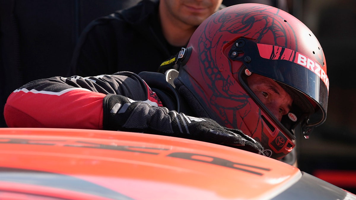 Keanu Reeves spins out during professional racing debut at Indianapolis  at george magazine