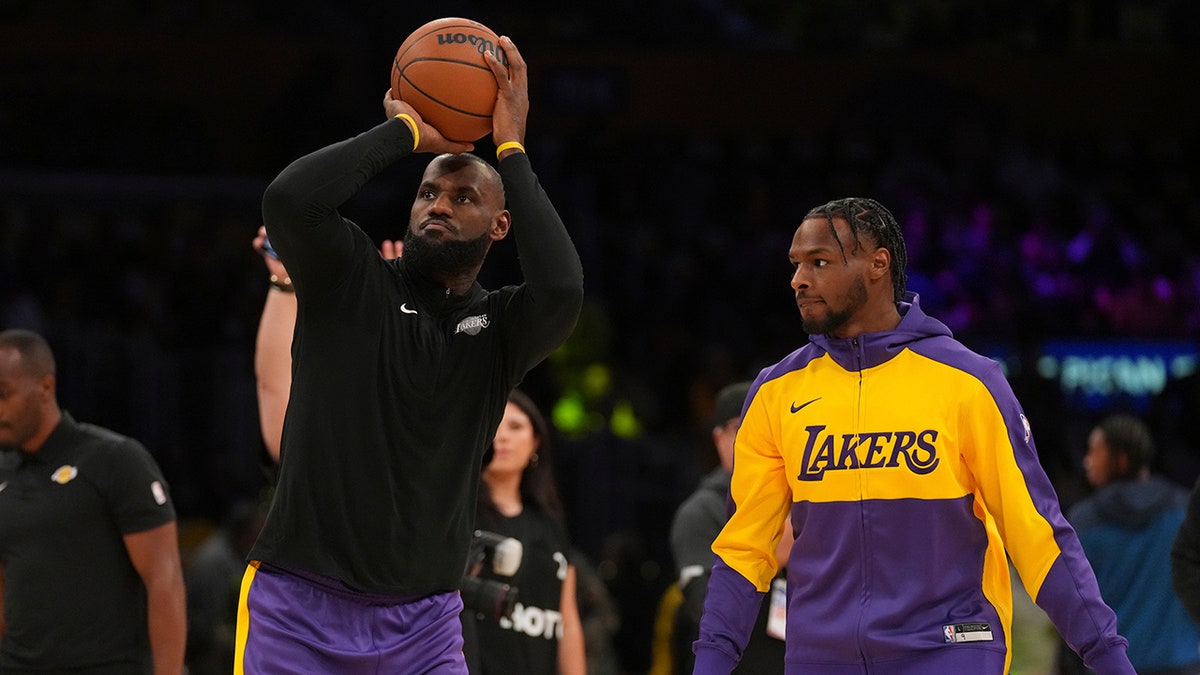 LeBron and Bronny James lukewarm  up