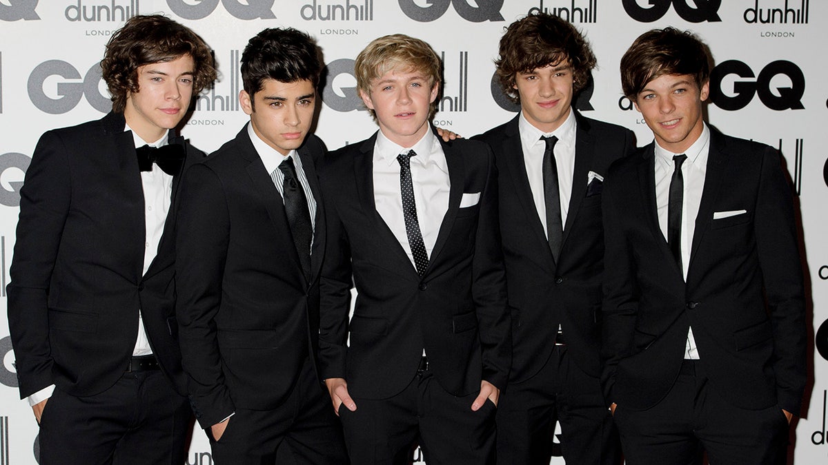 One Direction's Liam Payne poses for a photo with bandmates Harry Styles, Zayn Malik, Niall Horan and Liam Tomlinson