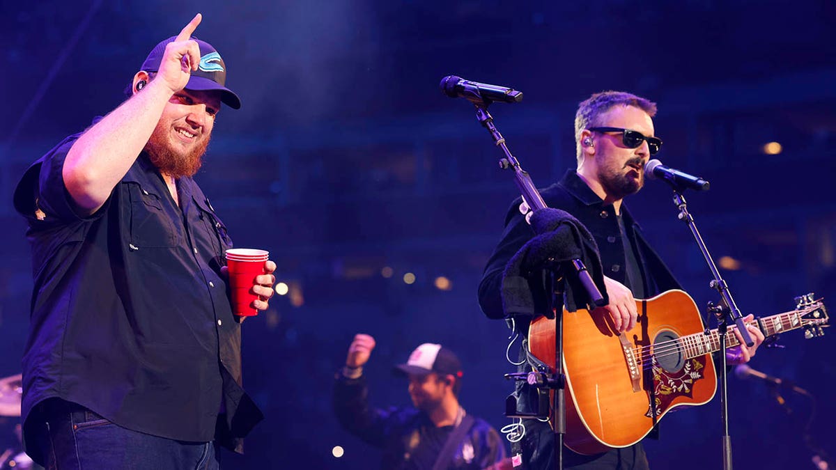 Eric Church and Luke Combs in concert