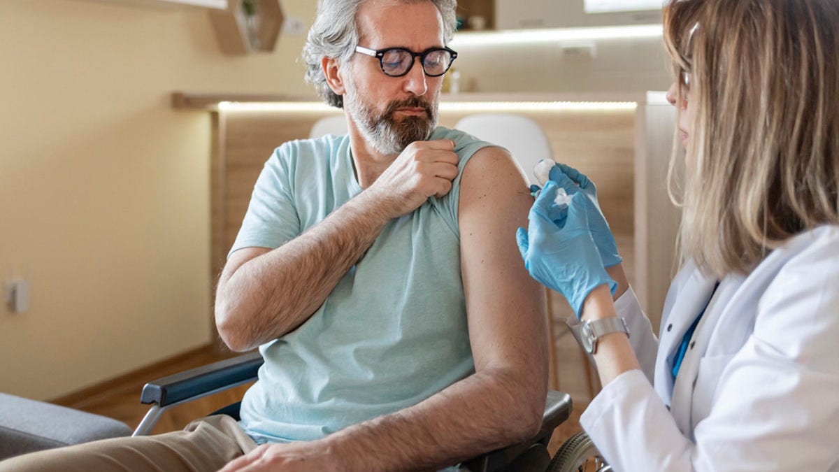 Man getting vaccine